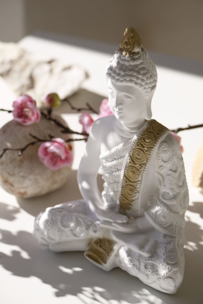 Reiki buddha figurine still life